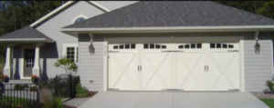 carriage house style garage doors on family home