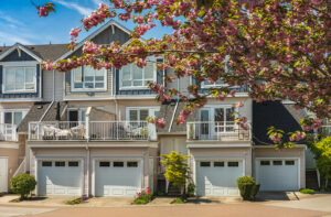 Homes with white garage doors