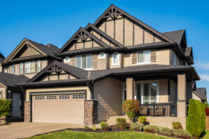 Suburban home with a tan garage door